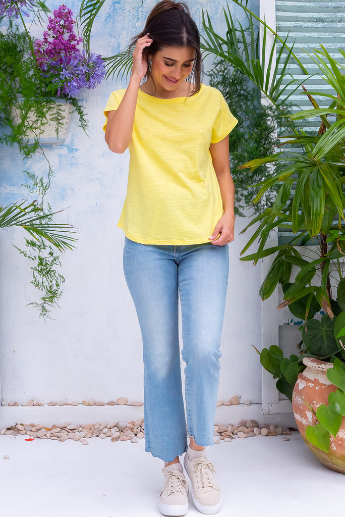 The Phoenix T-Shirt Sunflower is a gorgeous yellow coloured t-shirt, featuring a classic t-shirt cut, curved hem and loose fit. Made from 100% knit cotton.