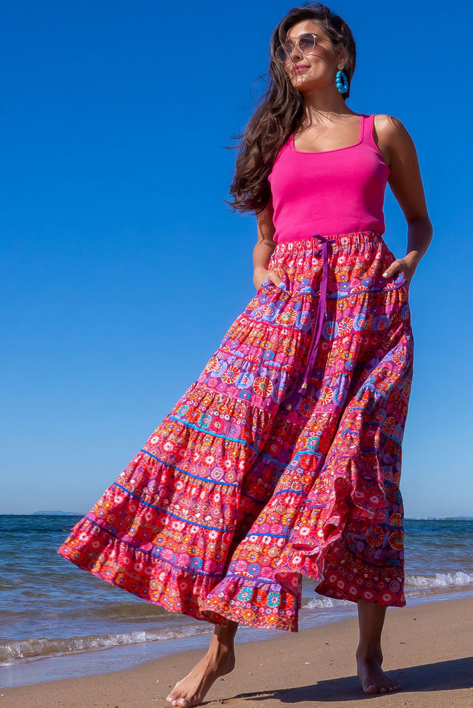 We love bold colours for spring, and the Duo Hotty Pink Tank Top is the ultimate fun wardrobe essential for layering this season! Pair it with shorts & a hat for a chic weekend style, or team it with a floral maxi skirt for a vintage look! Knit 100% cotton, Ribbed texture, Lightweight.