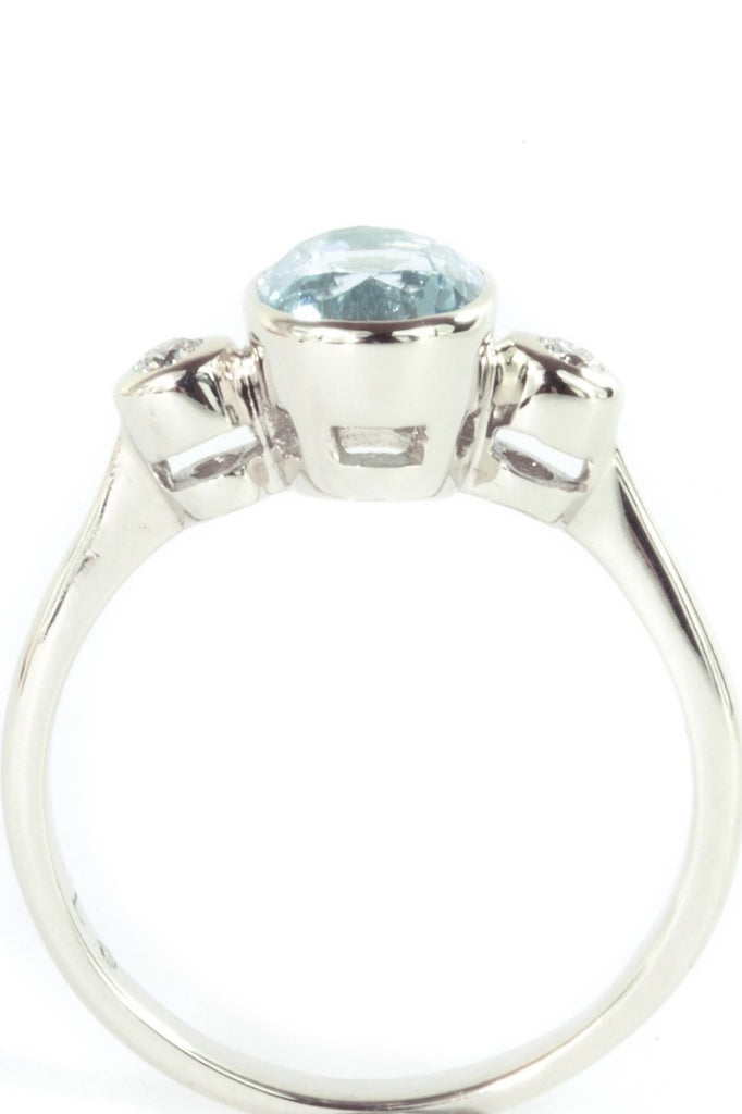  This classically styled ring holds a magnificent 8x6mm 1ct+ completely natural and unheated Mozambique Aquamarine with a sparkling 0.03ct F-G VS diamond on either side.