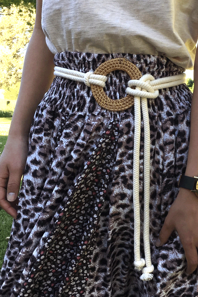 A thick cream rope with a natural tan rattan belt loop