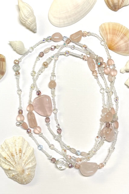 The Serendipity Necklace is a beautiful gentle pink rose quartz, with an assemblage of new, old and repurposed stones, each stone has a story to tell and together they are a powerful link to what was and what is to come.