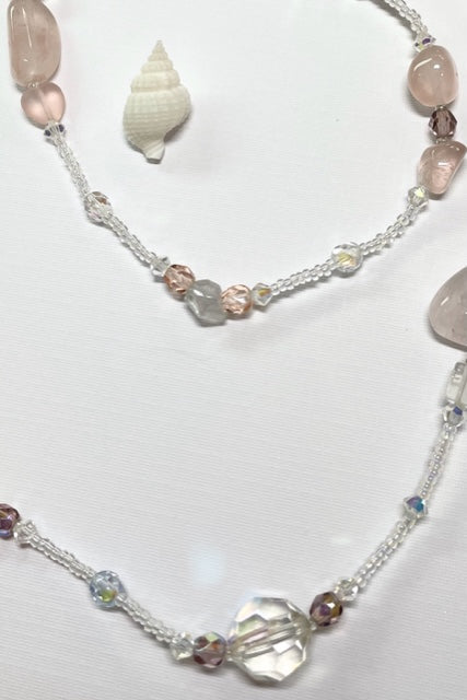 The Serendipity Necklace is a beautiful gentle pink rose quartz, with an assemblage of new, old and repurposed stones, each stone has a story to tell and together they are a powerful link to what was and what is to come.
