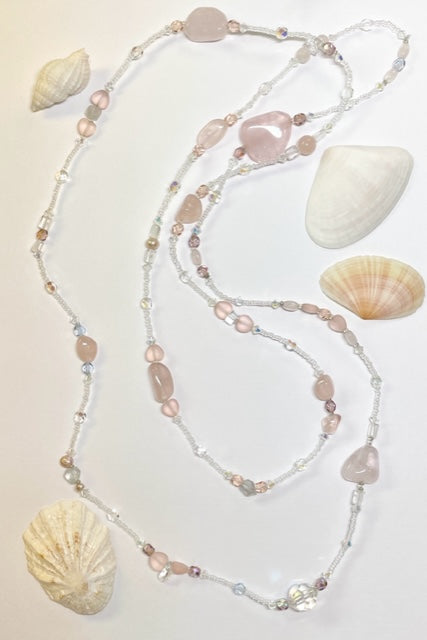 The Serendipity Necklace is a beautiful gentle pink rose quartz, with an assemblage of new, old and repurposed stones, each stone has a story to tell and together they are a powerful link to what was and what is to come.