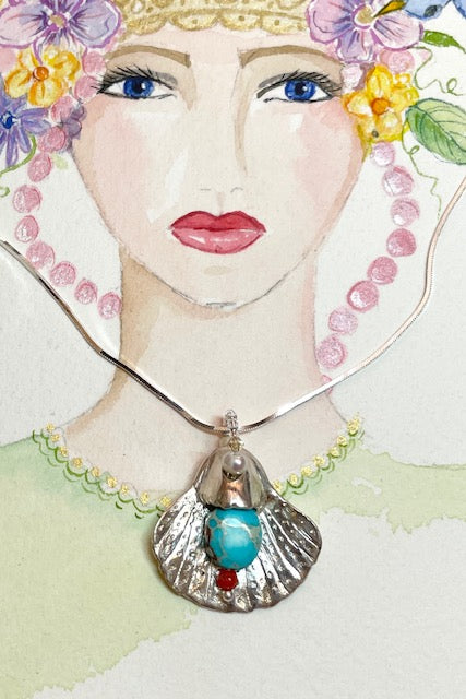 The pendant is solid silver, it is cast from a shell fossicked on a Queensland beach, it is enhanced with etched markings on one side, the other side takes the form of the shell it was cast off. This pendant is handmade and totally unique