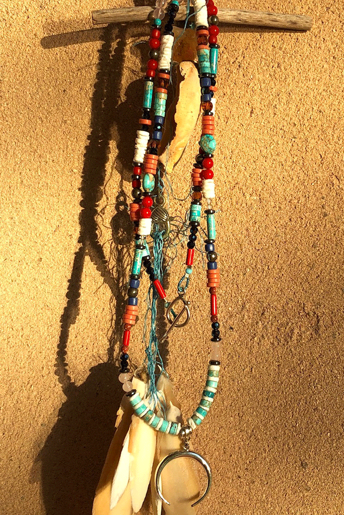 A powerful gemstone necklace with natural stones. Perfect to wear with chic boho luxe clothing an exclusive design