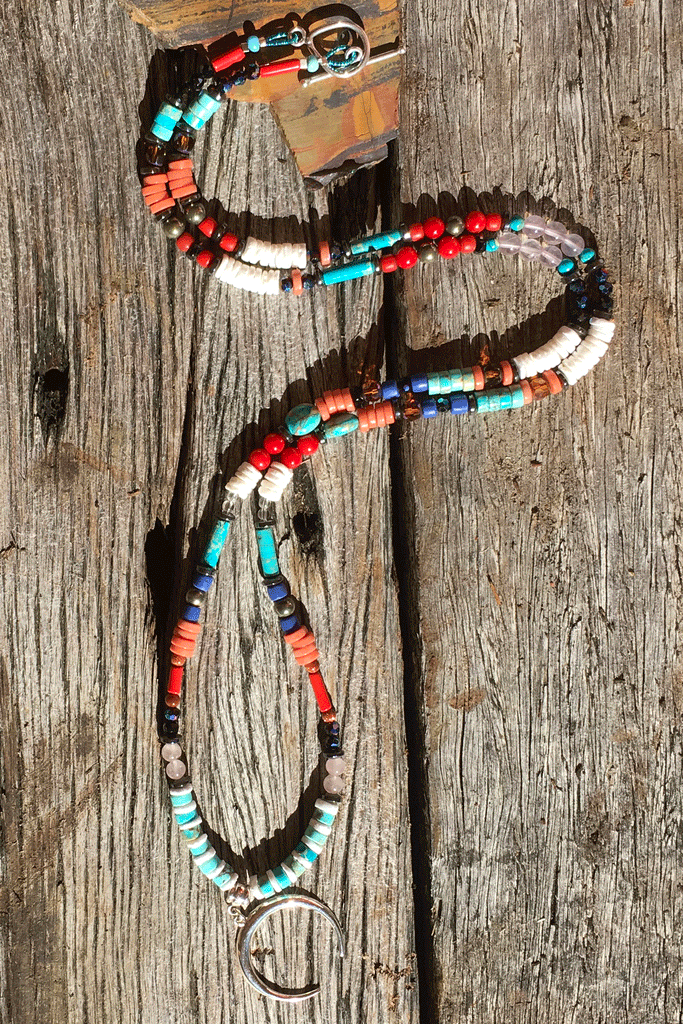 A powerful gemstone necklace with natural stones. Perfect to wear with chic boho luxe clothing an exclusive design
