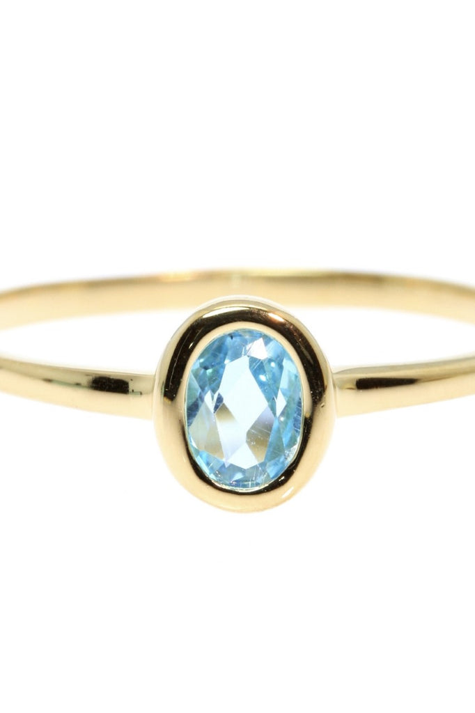 A lovely classic bezel set gemstone ring, choose a bright Rhodolite garnet or a sweet blue topaz. Rose gold vermeil setting.