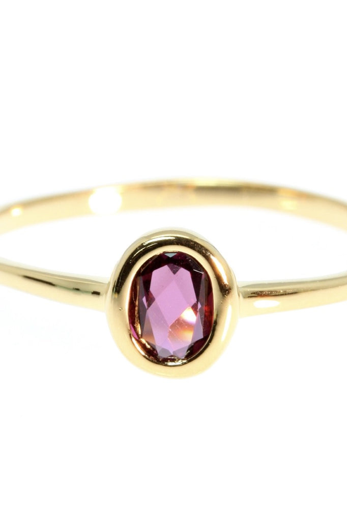 A lovely classic bezel set gemstone ring, choose a bright Rhodolite garnet or a sweet blue topaz. Rose gold vermeil setting.