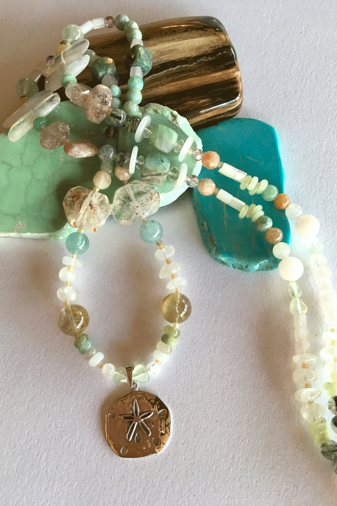 Pretty gemstone necklace with natural gemstones. Perfect to wear with chic boho luxe clothing an exclusive design