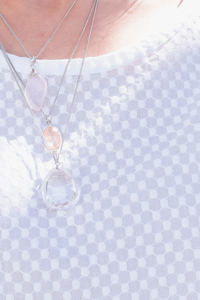 Pendant of Rutilated Quartz on a Silver Chain, rock crystal pendant