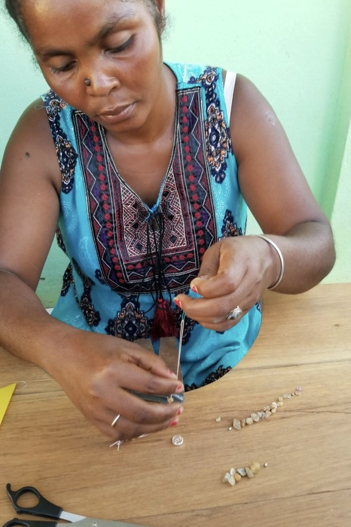 his pendant is a lovely piece of deep grey green Agate stone that has been skillfully cut into a pleasing swirl shape then polished, by ROAM Ladies Lapidary Collective in Sakaraha, Madagascar. This collective was created with aid funds from the Australia