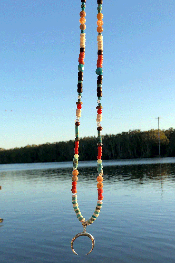 Necklace Cay Crescent Tucson with Natural Gemstones, 925 sterling silver pendant, Stones include Coral, Rock Crystal, Howlite, Haematite, Antique Glass, Rose Quartz, Shell and Antique African beads.